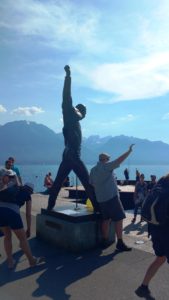 Fans posing with Freddie Mercury's Statue in Montreux in Lake Geneva Region